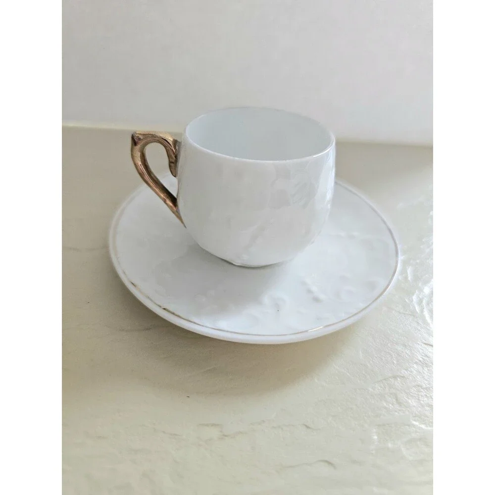 Vintage Miniature White Raised Design Cup And Saucer
